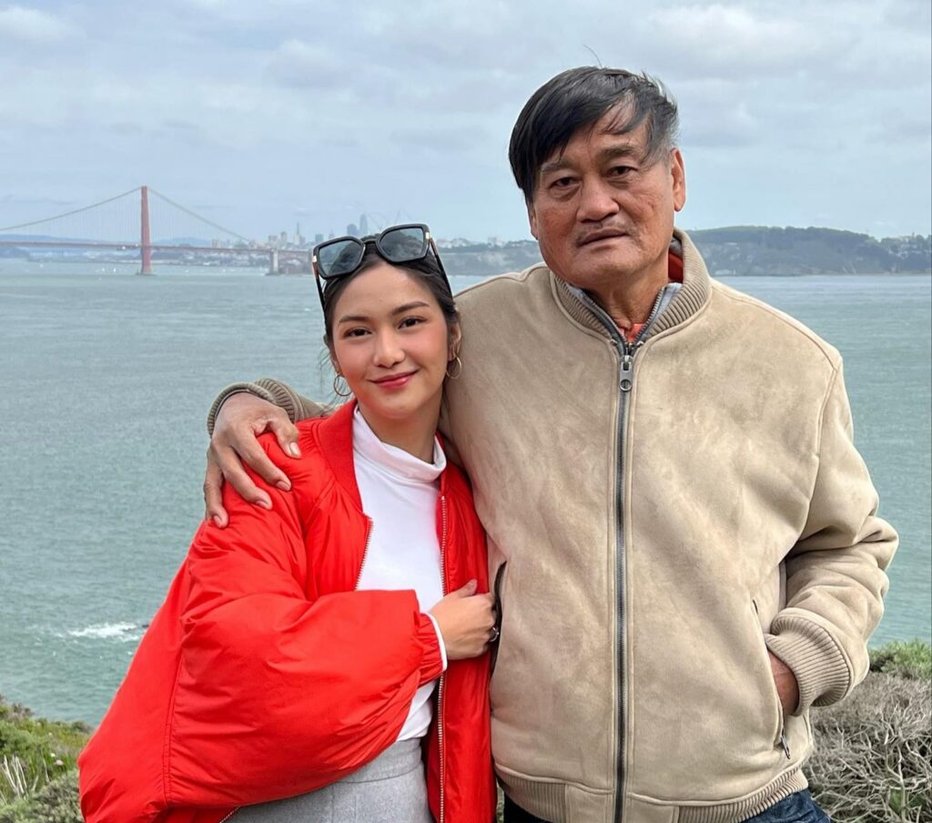 Charlie Dizon with her father