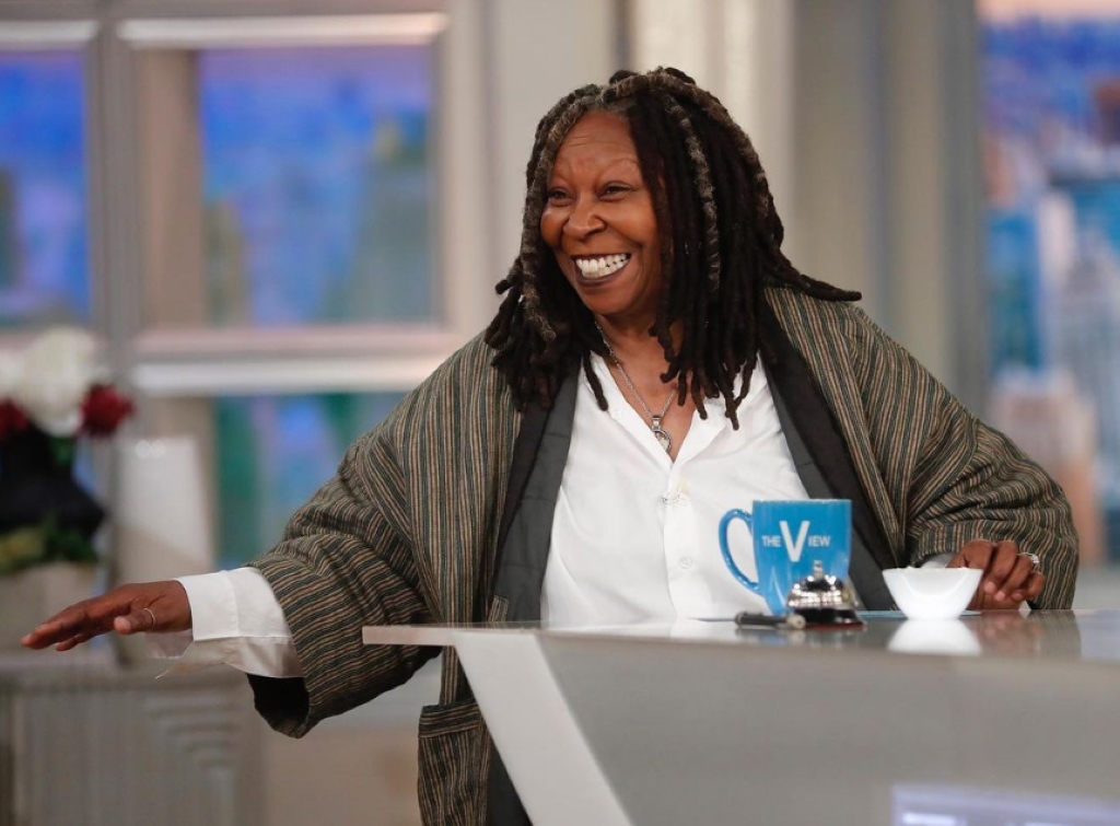 Whoopie Goldberg in her daily talk show smiling