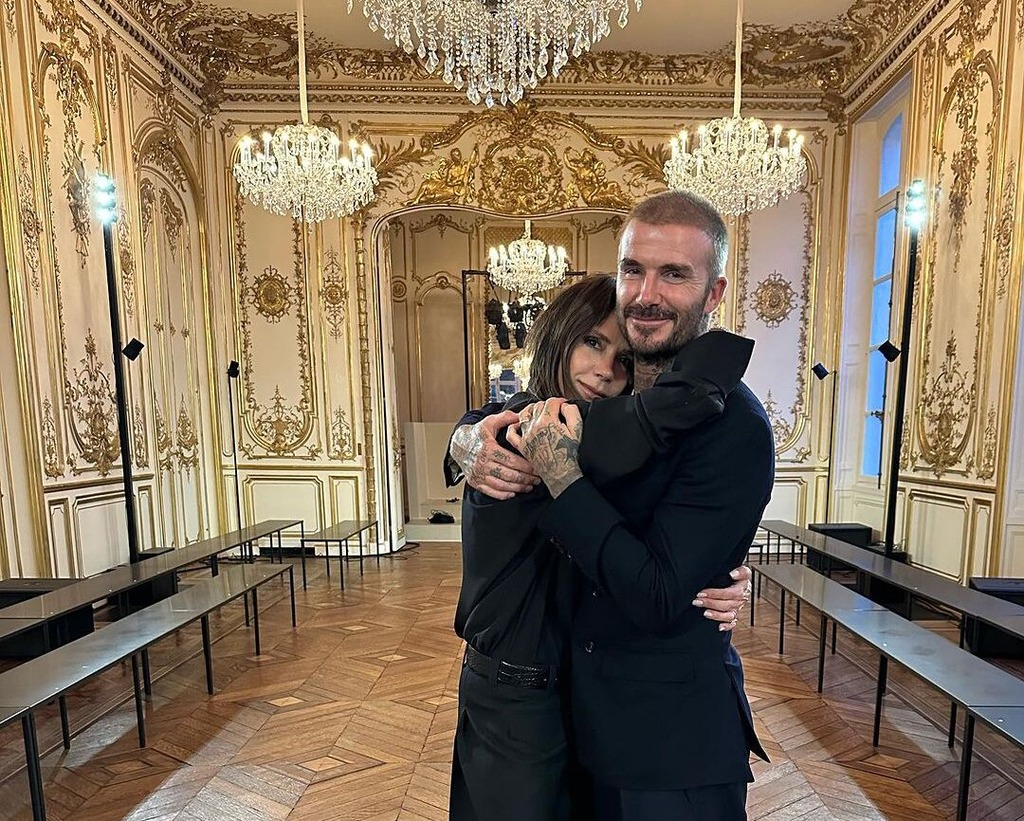 David Beckham hugging his wife
