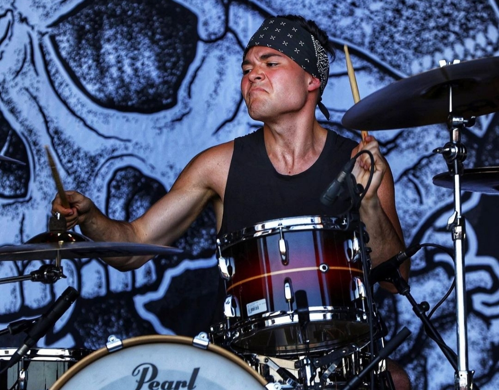 Greyson Nekrutman playing drum intensely