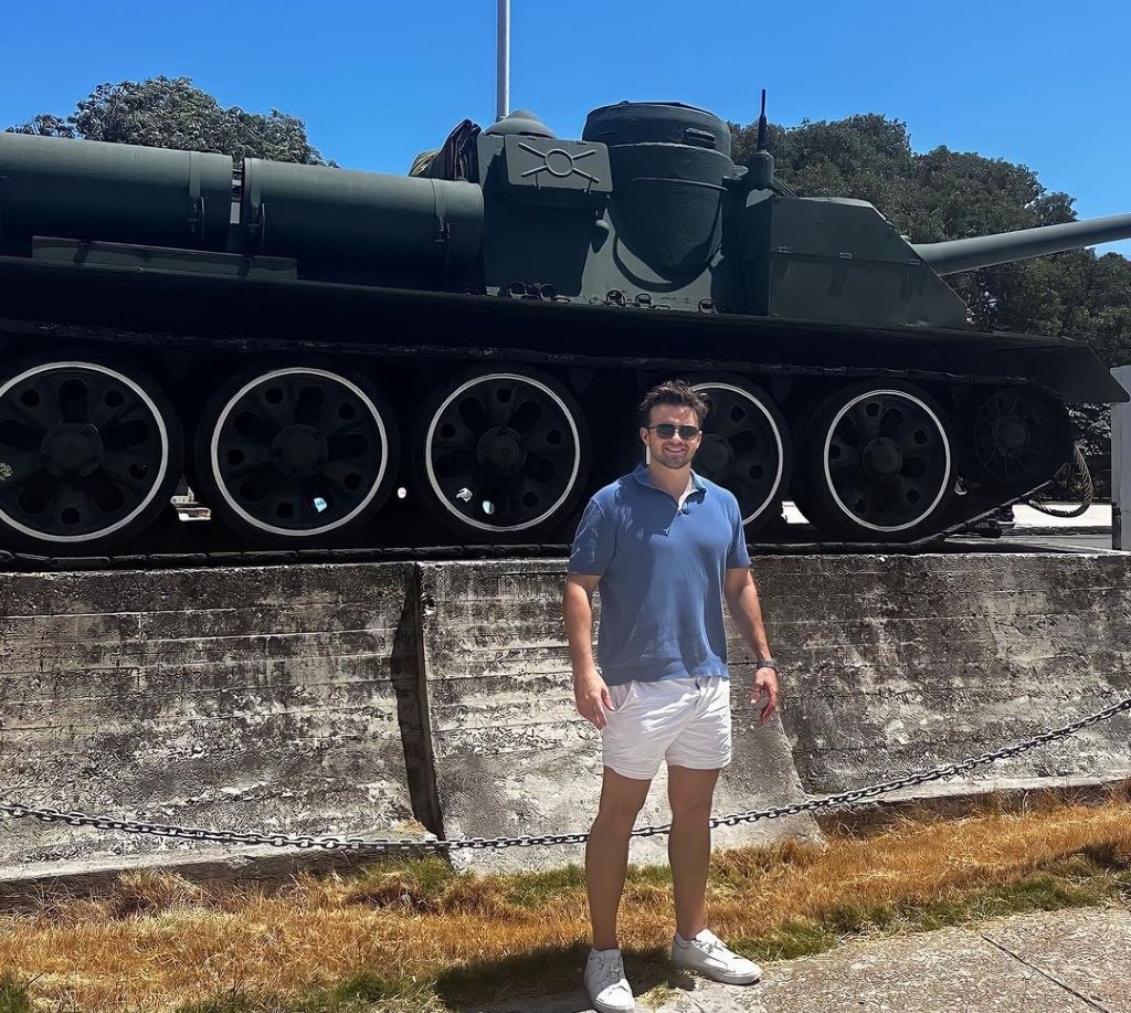 Jackson in front of Soviet SAU-100 tank 