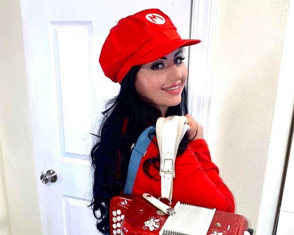 Jennifer Degollado in red hat