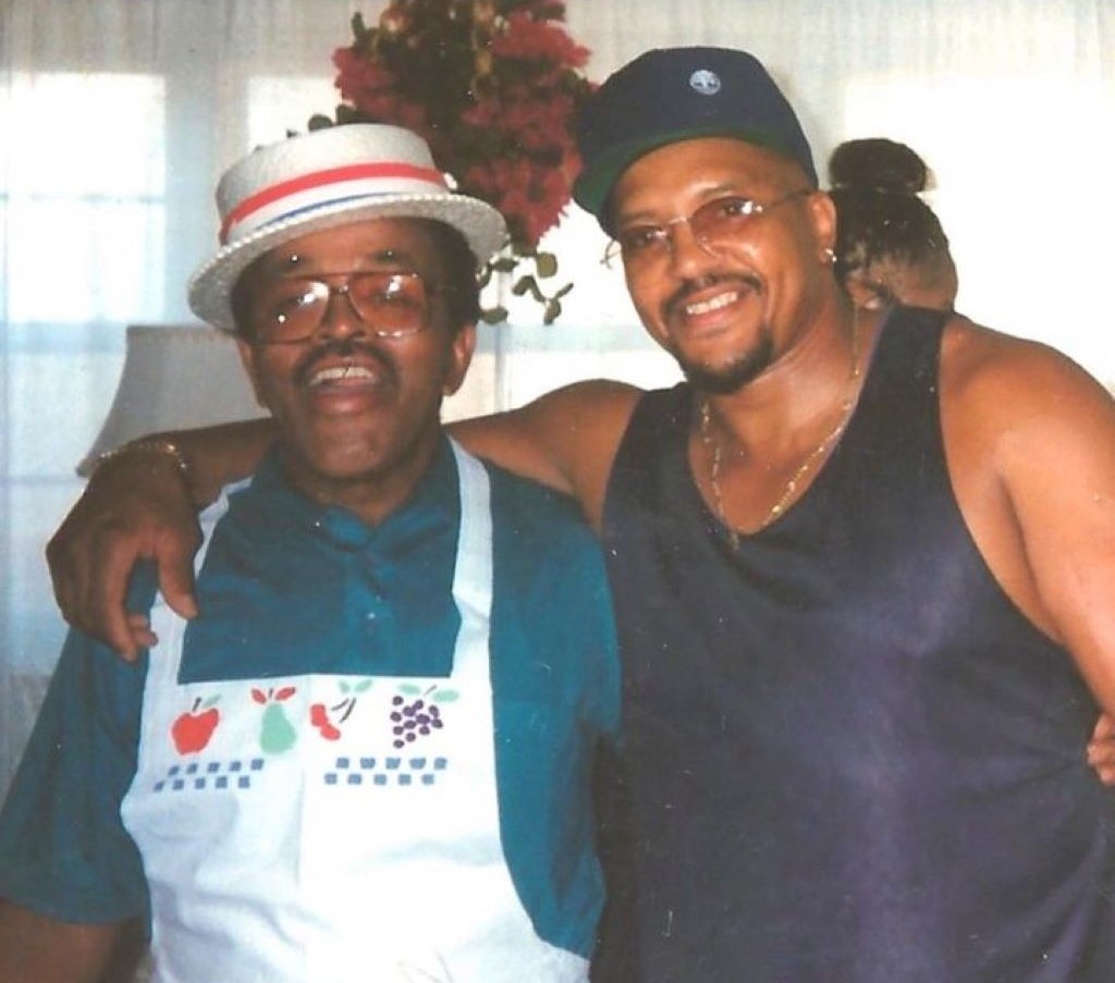 Tisha Campbell father and grandfather posing for the picture