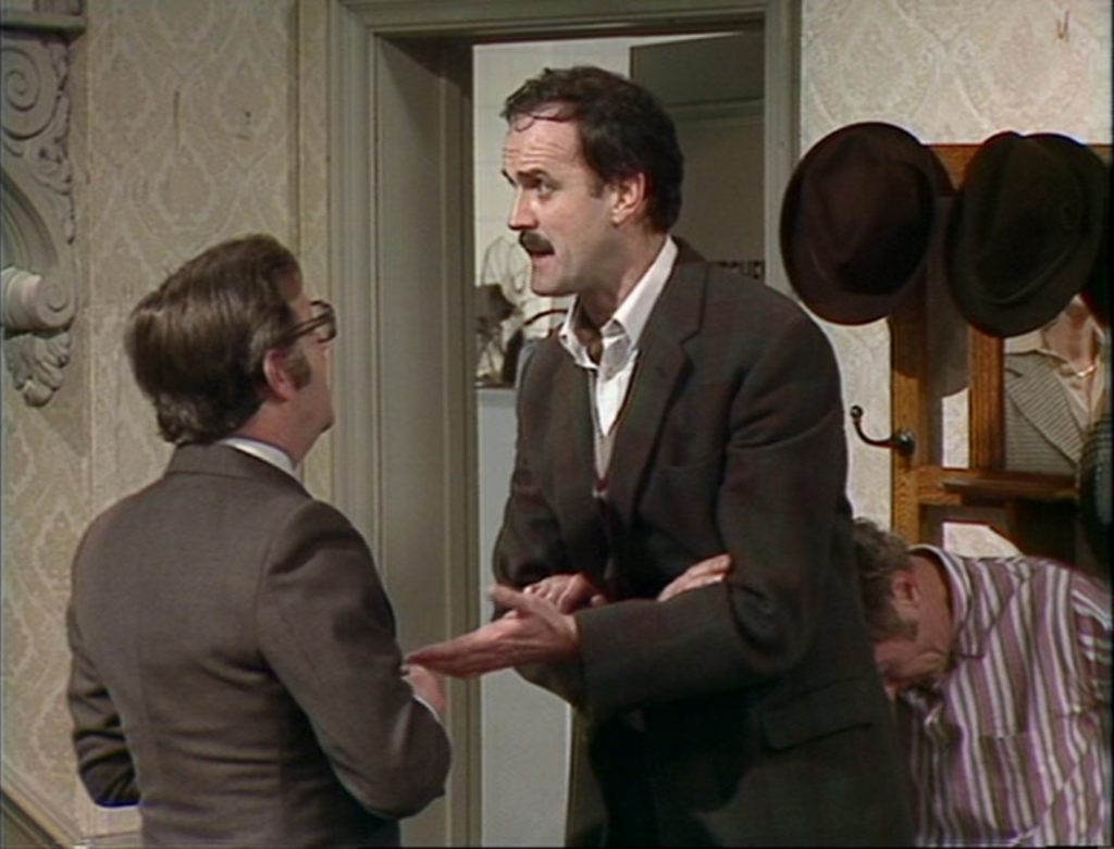The character of Manuel, the bumbling Spanish waiter, is played by the British actor Andrew Sachs, who was well known for his physical comedy in the role.
