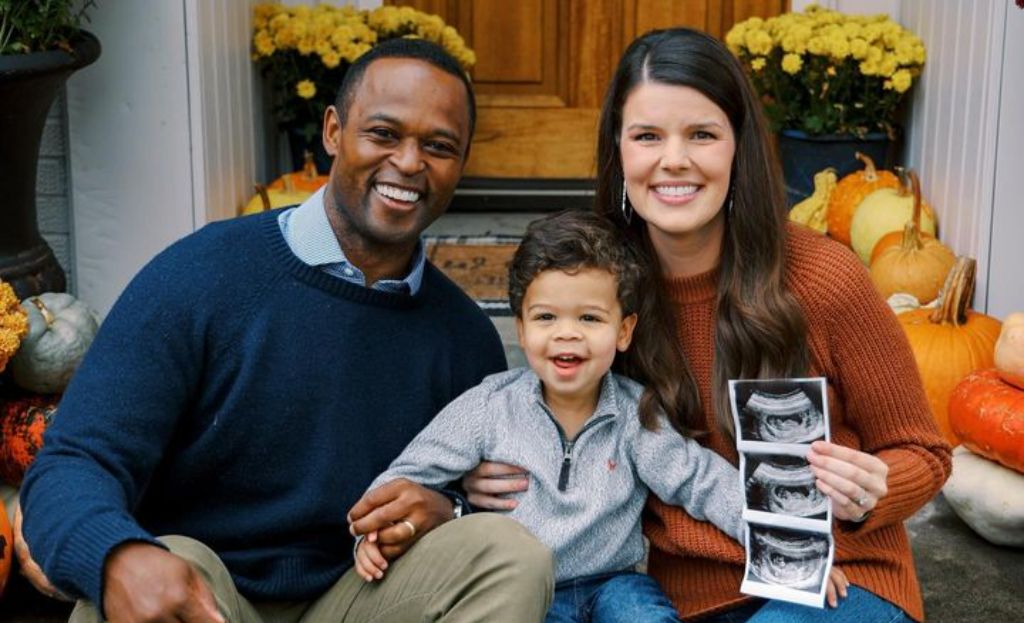 Daniel Cameron with his wife and kid.