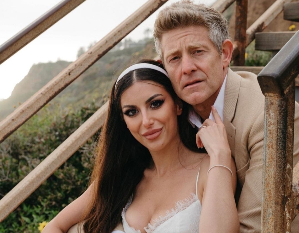 Nivine Jay taking a picture wit her fiance Jason Nash