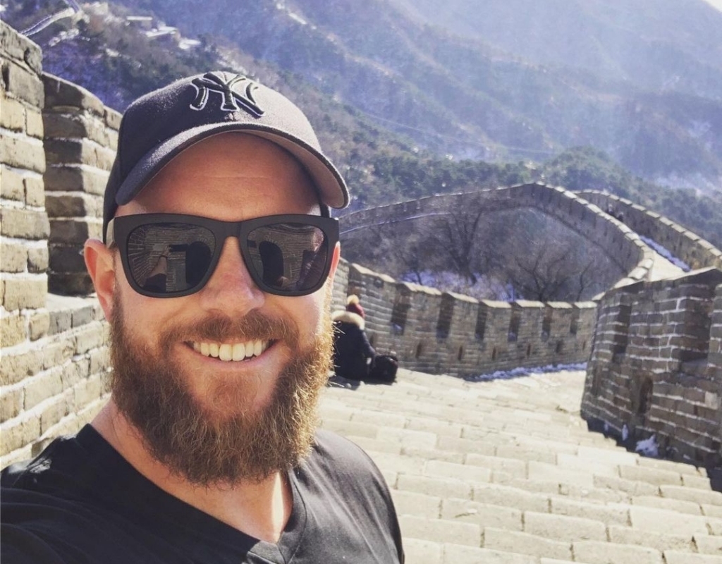 Aaron taking a picture at the Great Wall of China