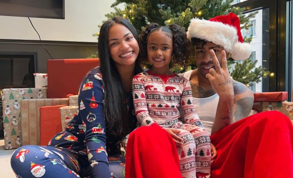 Freo and Jasmine celebrating Christmas with their daughter.