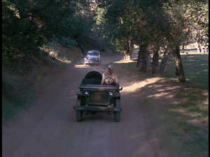 The episode is primarily set in a Western environment, as Wonder Woman and Steve Trevor investigate a cattle rustling operation.