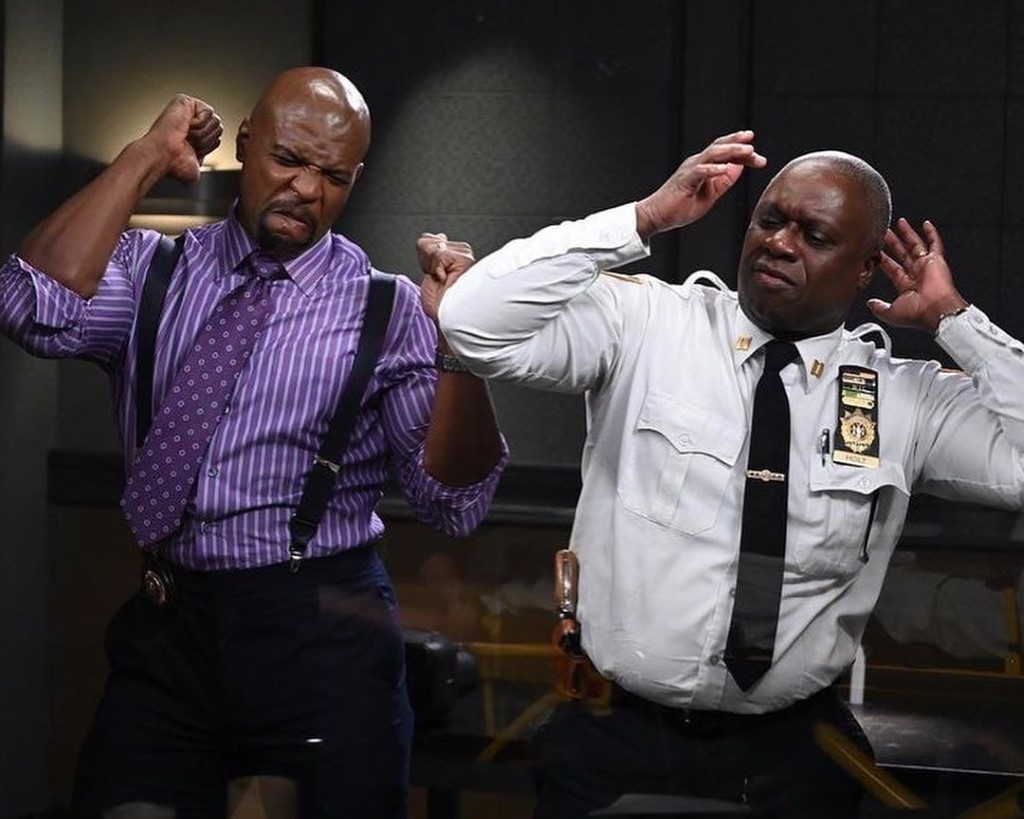 Andre Braugher seems dancing with his crew member during the shoot.