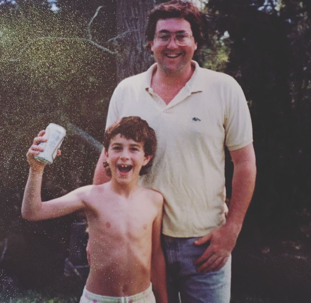 Young Beau pictured while laughing with his father 