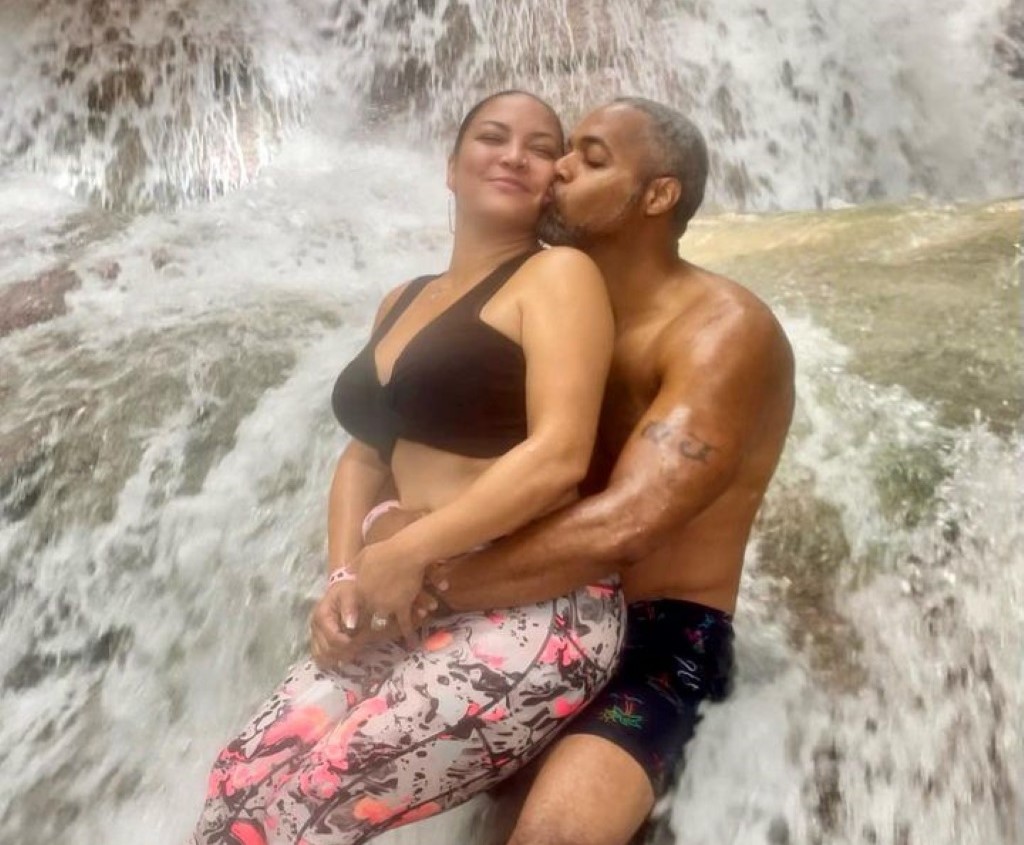 DJ Mike Jackson and Egypt Sherrod in a waterfall.