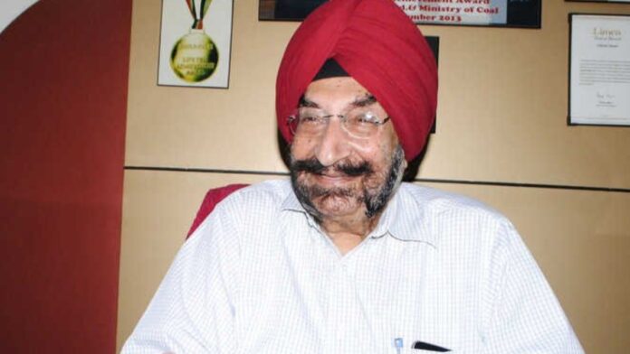 Jaswant Singh Gill smiling for the photo