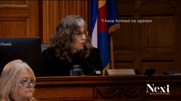 Judge Sarah Wallace clicked during a hearing.