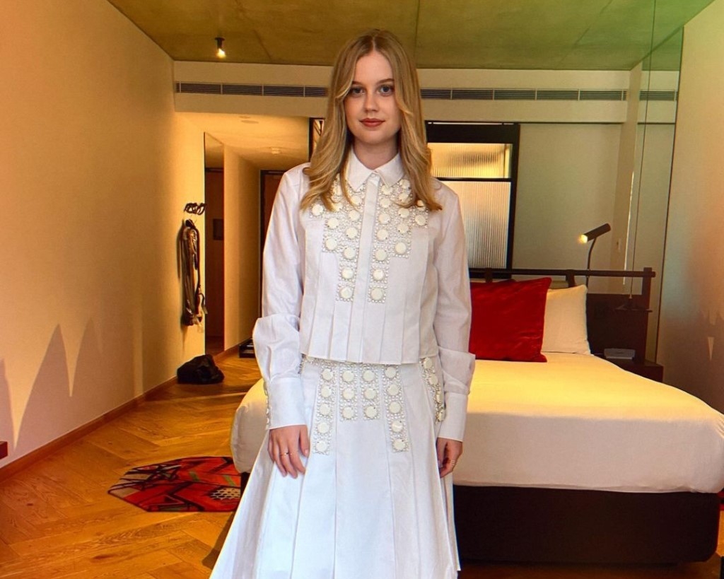 Angourie captured in a white dress.