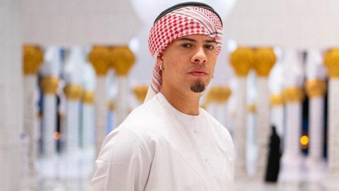 Austin McBroom's side profile wearing Arab cloths