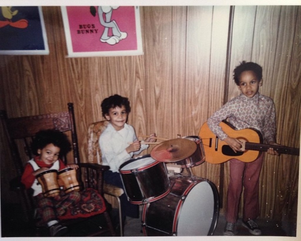 Keri Lewis captured playing guitar in his childhood. 
