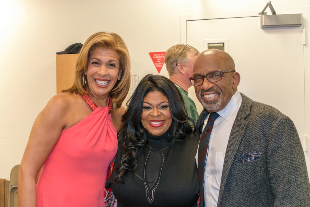 Kim Burrell captured along with a women and a man. 