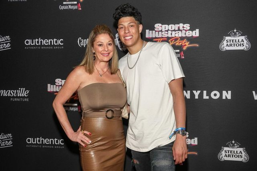 Randi with her youngest son Jackson Mahomes at a sports fest.