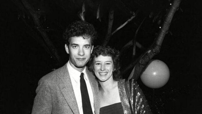 A black and white picture of Samantha Lewes and Tom Hanks.
