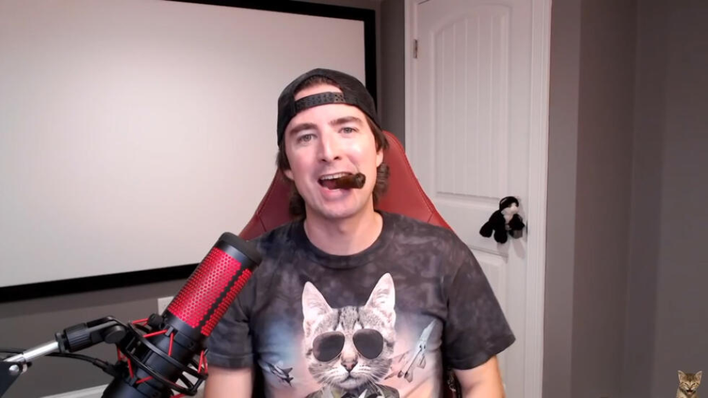 Keith flexing smoking cigar online to the viewers.