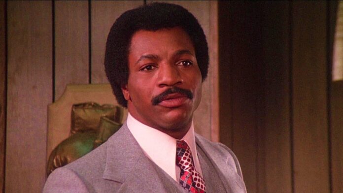 Carl Weathers in a suit and tie