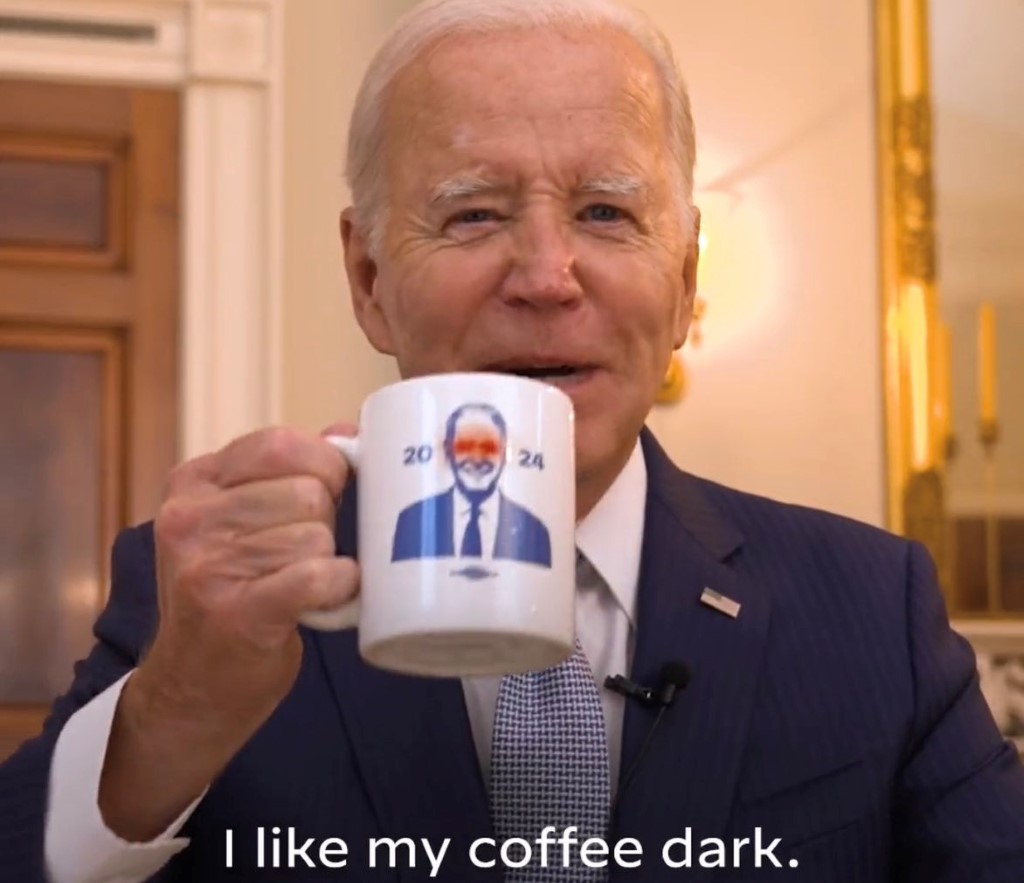 Joe Biden with a cup