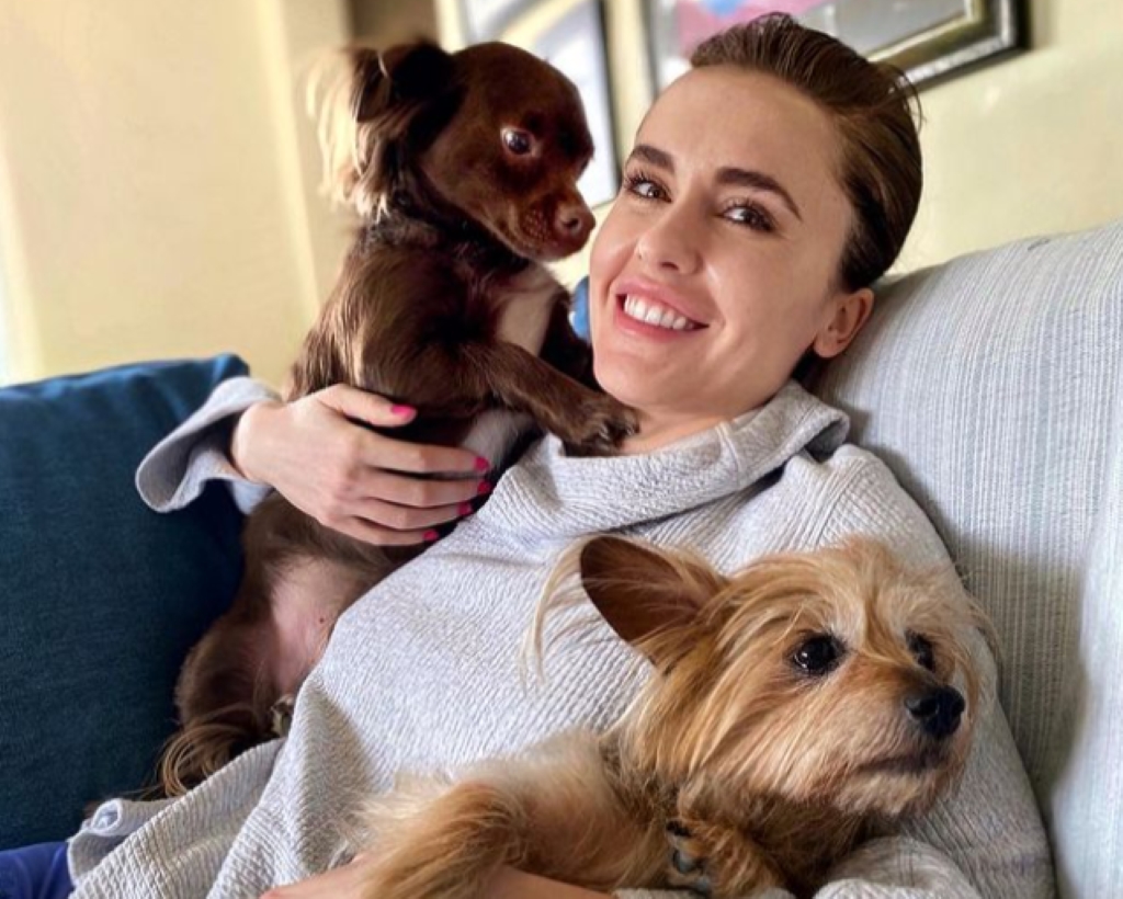 Molly Sasso holding her dogs