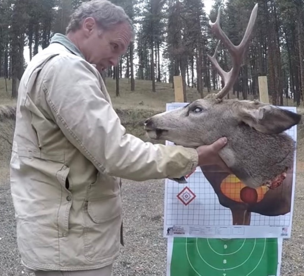 Paul Harrell hold deer head