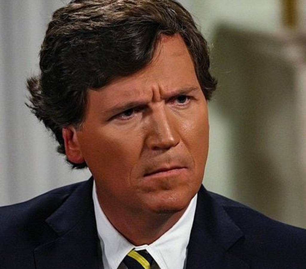 Tucker Carlson looking confusingly looking at someone