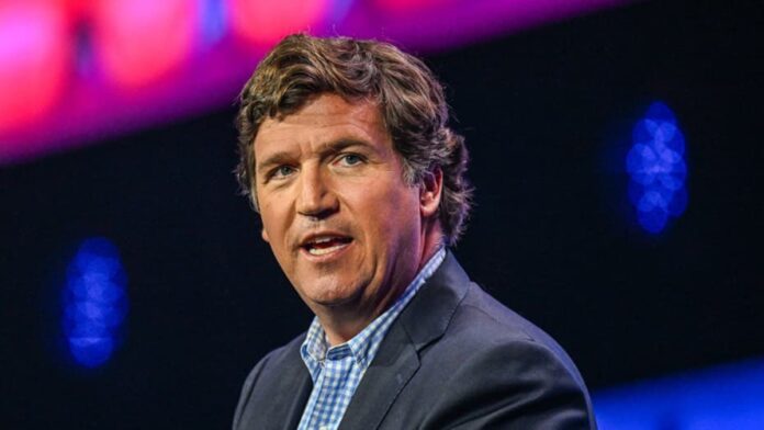 Tucker Carlson pictured while talking